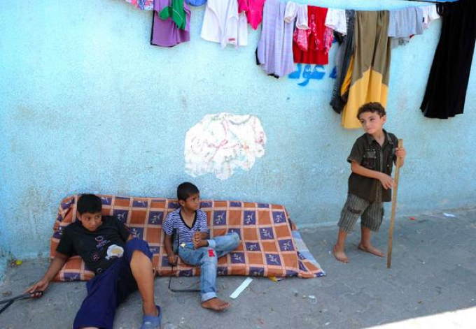 086_Almost_half_of_the_displaced_in_our_Gaza_shelters_are_children