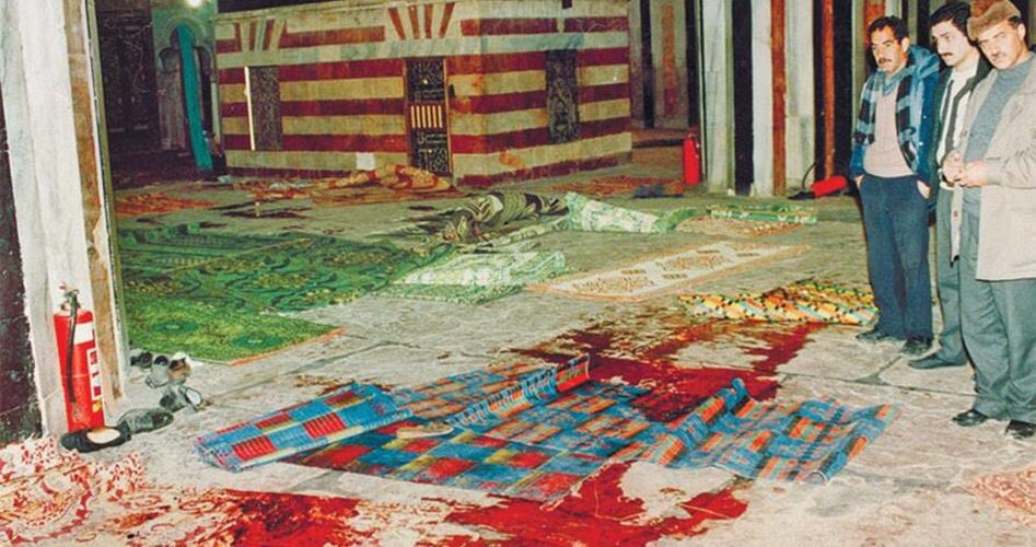 Palestinians survey bloodstained rugs at Ibrahimi mosque 1994 massacre