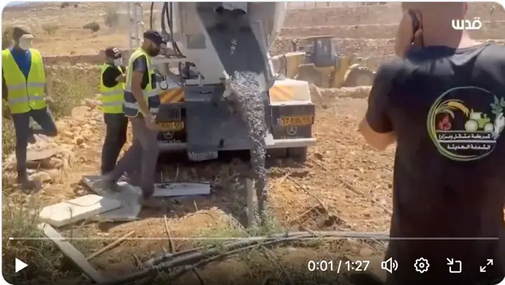 072_pouring-cement-into-water-springs-used-by-Palestinians